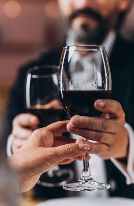 Cropped view of the pretty mature husband and wife are celebrating their anniversary